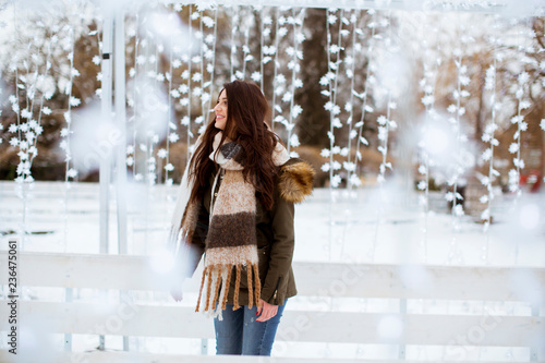 Young woman in winter park