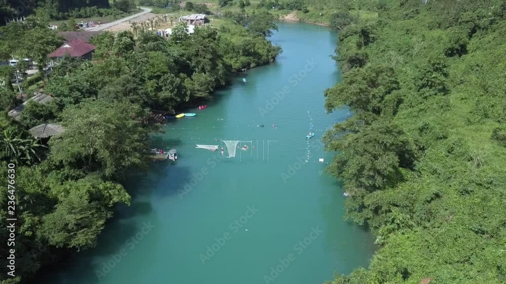 camera shows boats nets in river near village houses camera shows boats nets in river near village houses