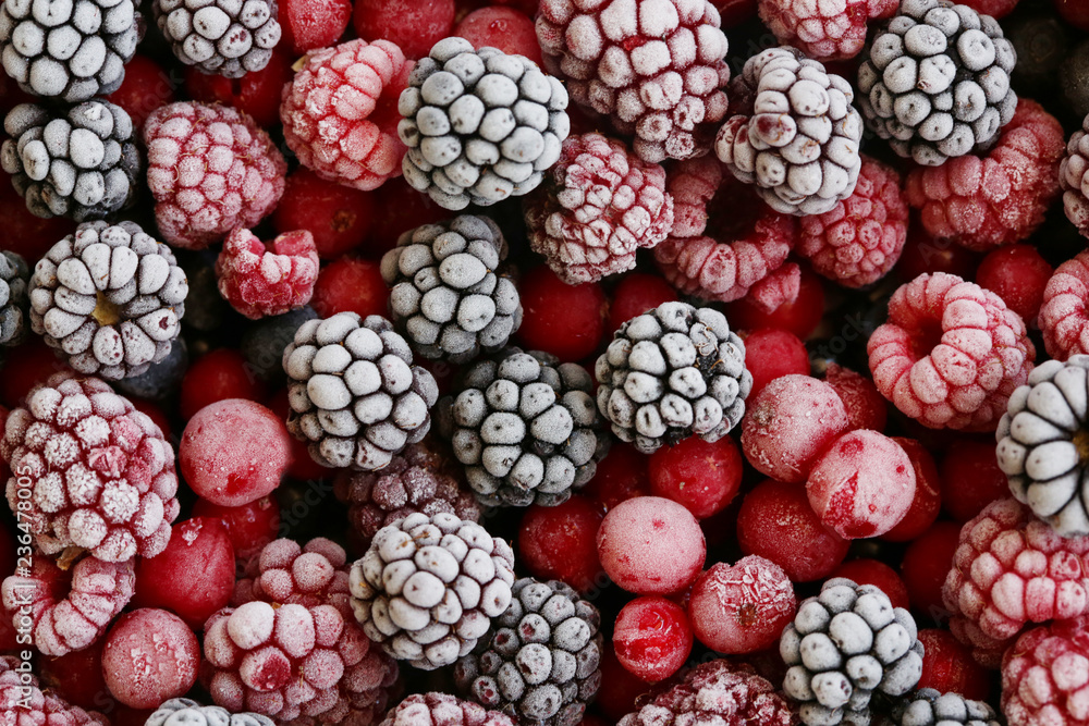 frozen berries used as background; - obrazy, fototapety, plakaty 