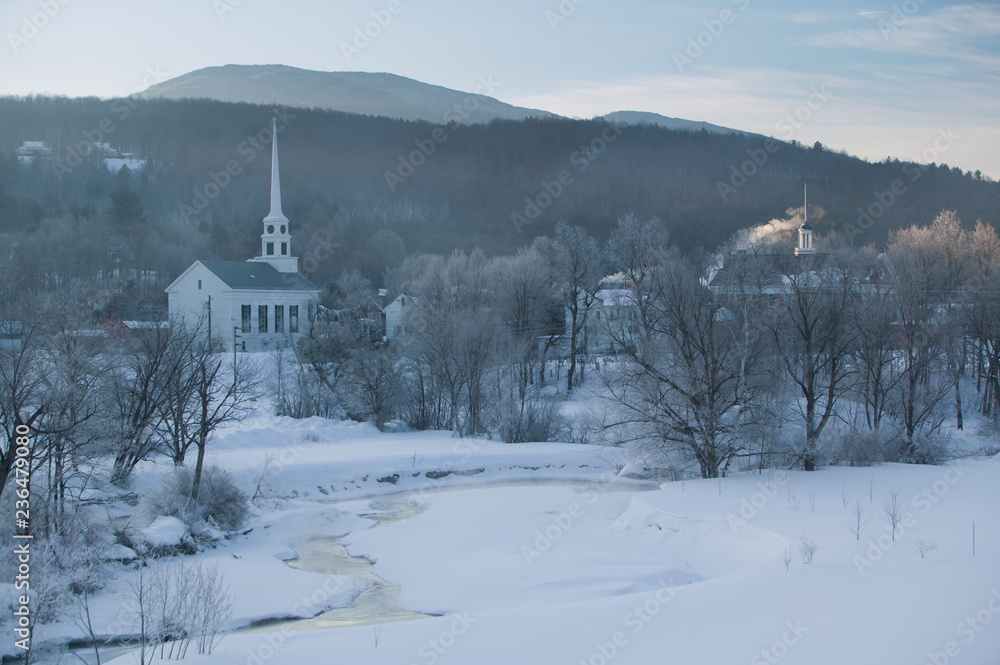 Sunrise over Stowe Community Church on a cold winter morning, Stowe, Vermont, USA