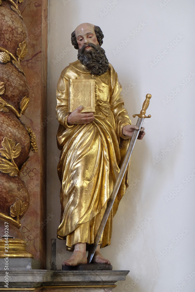 Obraz premium Saint Paul statue on the Beheading of John the Baptist altar in Maria im Grunen Tal pilgrimage church in Retzbach in the Bavarian district of Main-Spessart, Germany