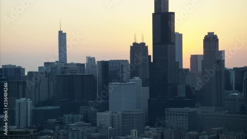 Aerial view at sunrise of Trump Tower condominiums Willis Tower Chicago Skyscraper buildings Financial District Illinois sunlight 