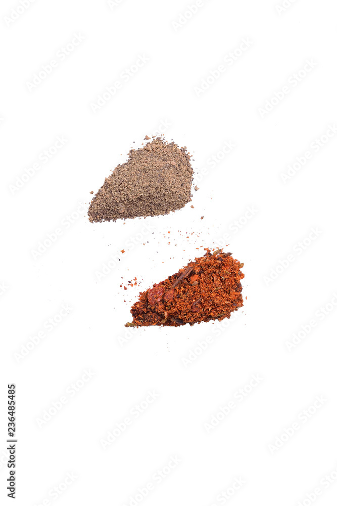 ground red and black pepper on white background ground red and black pepper on white background