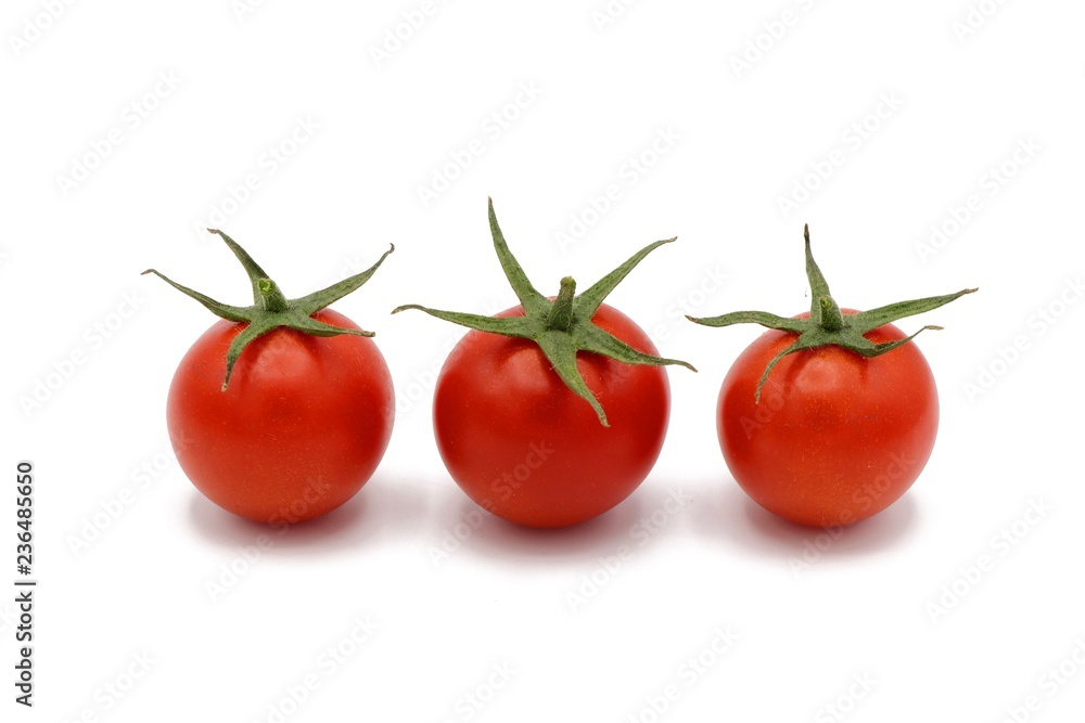 cocktail tomatos - fresh red cocktail tomatos isolated on white background cocktail tomatos - fresh red cocktail tomatos isolated on white background