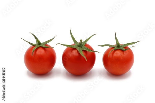 cocktail tomatos - fresh red cocktail tomatos isolated on white background
