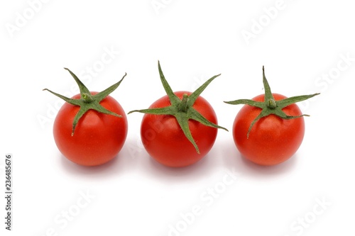 cocktail tomatos - fresh red cocktail tomatos isolated on white background