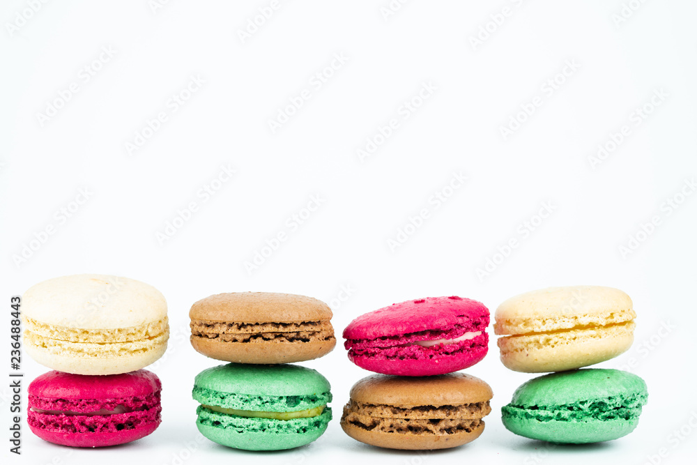 colorful macaroons on white background