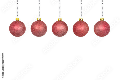 A pink Christmas bauble hanging on a white ribbon, isolated on a white background with a clipping path and copy space, christmas decorations.