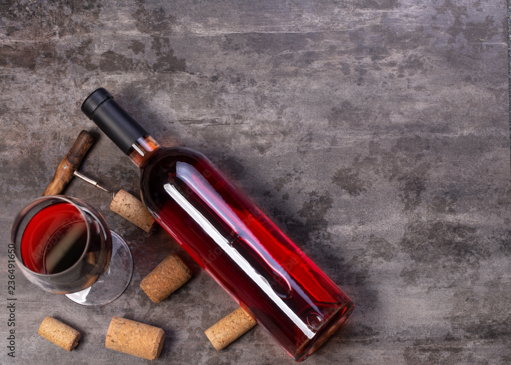 Obraz premium wine bottles and glass on table with copy space,