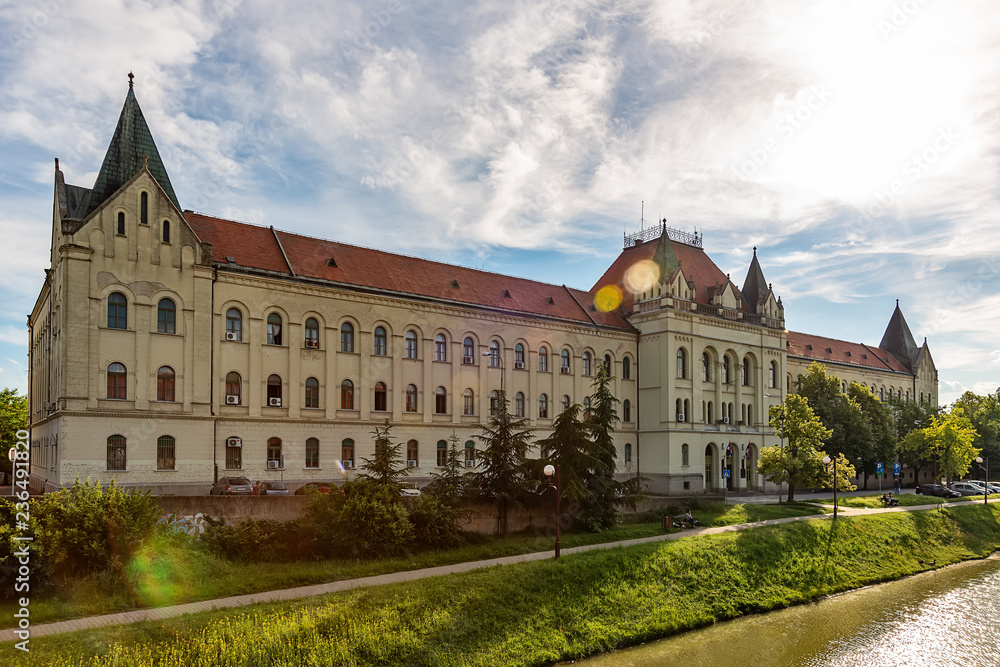 Zrenjanin, Serbia - May 17, 2018: City lake and Palace of Justice (Court House) in Zrenjanin.