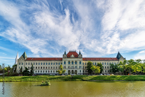 Zrenjanin, Serbia - May 17, 2018: City lake and Palace of Justice (Court House) in Zrenjanin.