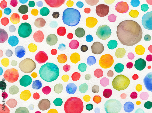 abstract watercolor background painting, fun hand painted circles in colorful daubs of blue red green yellow orange and pink on white watercolor paper texture