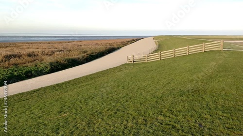 Dutch Dike on the Waddensea Netherlands Unesco World Herritage. photo