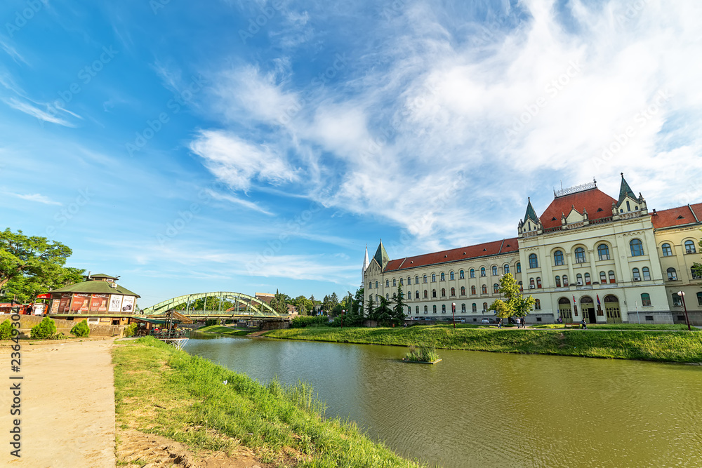 Zrenjanin, Serbia - May 17, 2018: City lake, Bridge and Palace of Justice (Court House) in Zrenjanin.