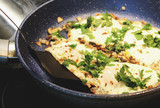Fried eggs with mushrooms and parsley