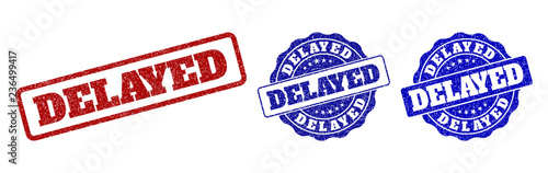 DELAYED grunge stamp seals in red and blue colors. Vector DELAYED signs with grunge surface. Graphic elements are rounded rectangles, rosettes, circles and text titles.