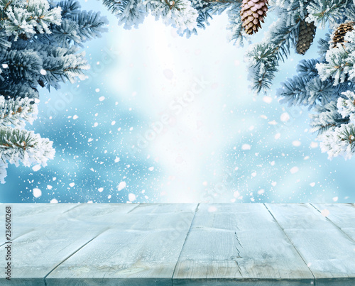 Merry Christmas and happy New, Year greeting background with table .Winter landscape with fir tree branch