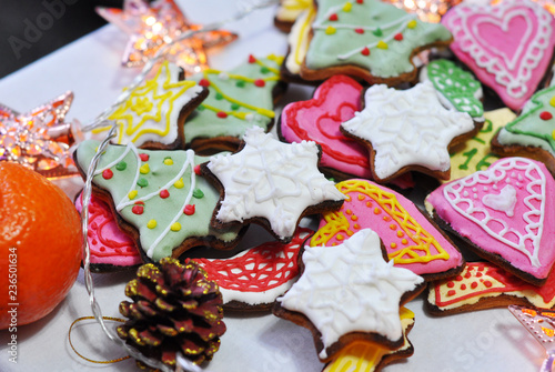 colourful christmas cookies with icing and sprinkles