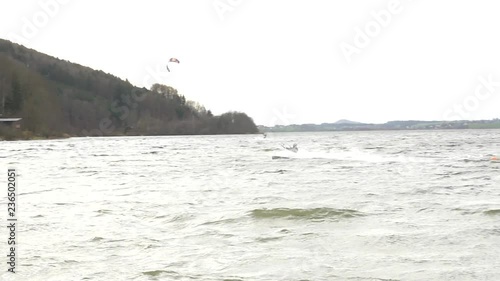 Cold Water Kite Surfing Big Air at Wallersee near Salzburg Austria Slow Motion photo