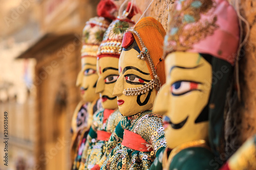 Rajasthani puppets (Kathputli) have been displayed on a shop at Jaisalmer Fort, Rajasthan. Kathputli is a string puppet theatre, native to Rajasthan, India, and is the most popular form of Indian  photo
