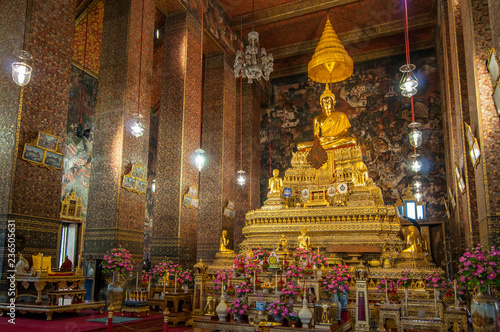  The Principal Buddha Image of Phra Buddha Deva Patimakorn in the Main Chapel or Assembly Hall, Wat Pho, Bangkok, Thailand.