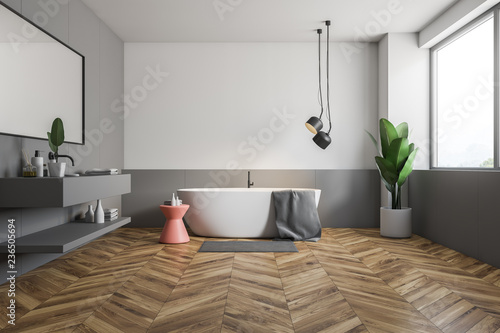 Wooden floor bathroom interior  tub and sink
