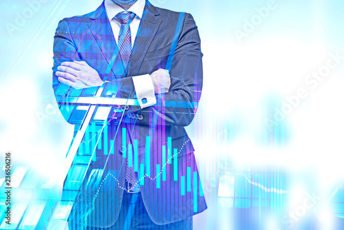 Crossed arms businessman, graph