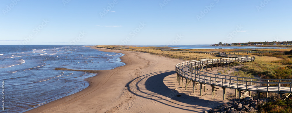 Panoramic view of a beautiful sandy beach on the Atlantic Ocean Coast. Taken in La Dune de Bouctouche, New Brunswick, Canada. - obrazy, fototapety, plakaty 