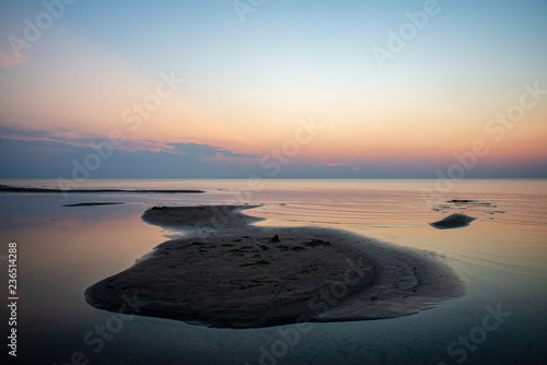 calm blue sunset over clear water in baltic sea