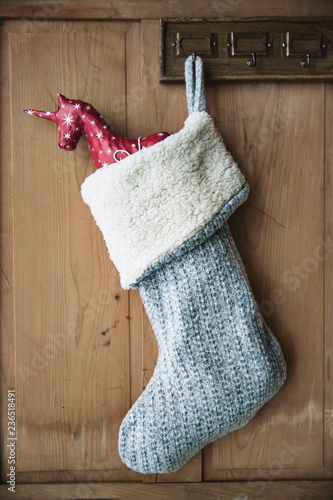 Christmas stocking and giftwrapped unicorn
