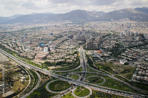 Top view of Iranian capital Tehran. Megapolis with road junctions photo