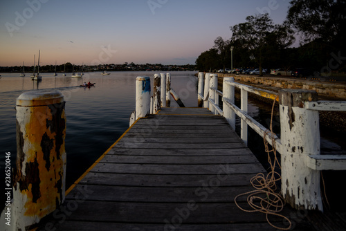 old wooden jetty  sunset  relax  calm  water  sea  boats.