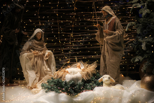 Christmas Manger scene with figures including Jesus, Mary, Joseph, sheep and magi.