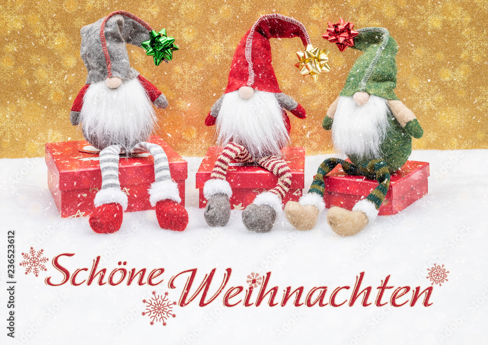 Φωτογραφία Weihnachten mit Wichteln auf  Geschenk-Kartons und Text Schöne Weihnachten
