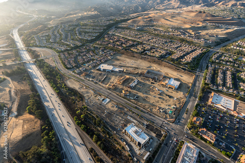 Late afternoon aerial view of shopping center construction, Rinaldi Street and the 118 freeway in the Porter Ranch community of Los Angeles, California. photo