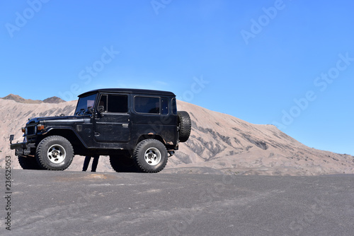 Black 4X4 vehicle at Bromo Savannah, Bromo Mountain, Bromo Tengger Semeru National Park, East Java, indonesia