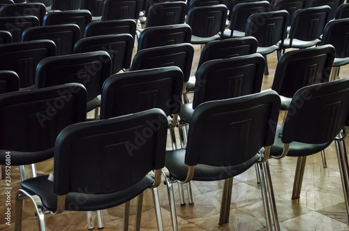rows of chairs in auditorium