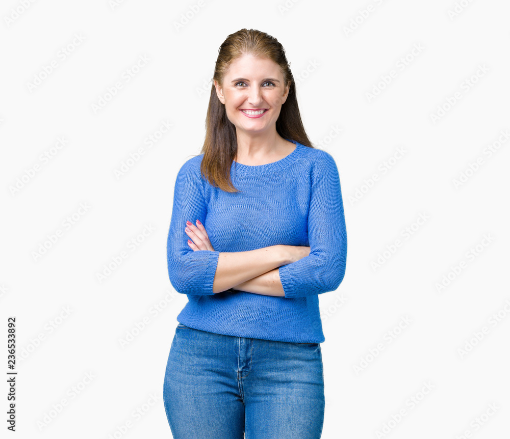 Beautiful middle age mature woman wearing winter sweater over isolated background happy face smiling with crossed arms looking at the camera. Positive person. Beautiful middle age mature woman wearing winter sweater over isolated background happy face smiling with crossed arms looking at the camera. Positive person.
