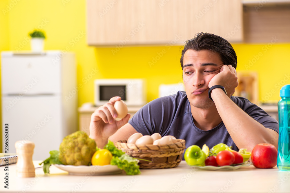 Young man in dieting and healthy eating concept Young man in dieting and healthy eating concept