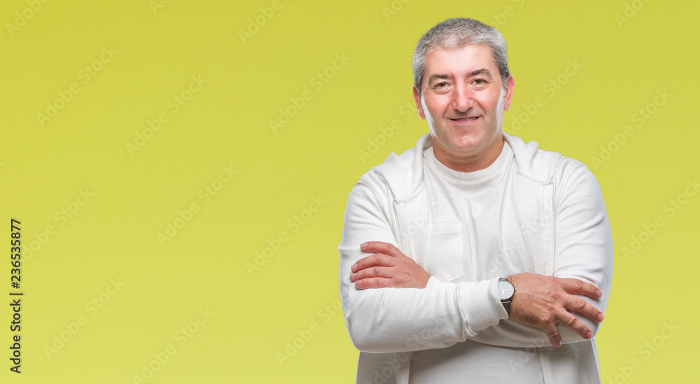 Handsome senior man wearing sport clothes over isolated background happy face smiling with crossed arms looking at the camera. Positive person. Handsome senior man wearing sport clothes over isolated background happy face smiling with crossed arms looking at the camera. Positive person.