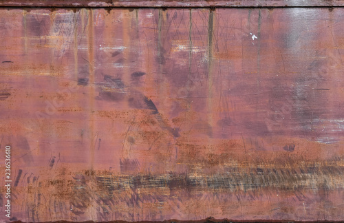 Old weathered and scratched steel texture. Rust on steel plate texture. Close up of rust on an old sheet of metal background