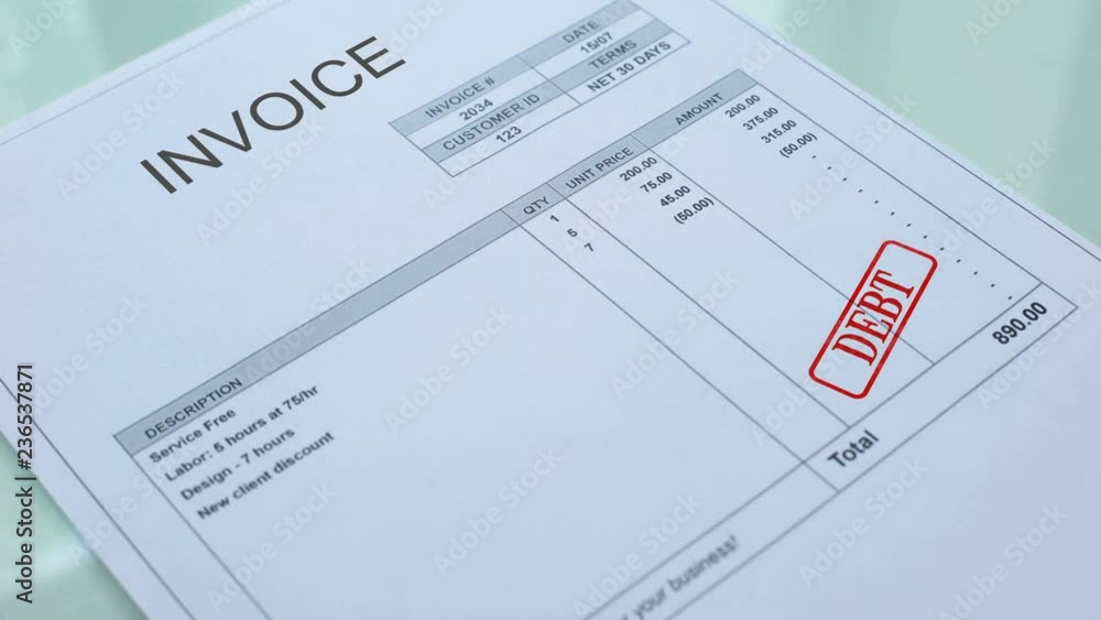 Invoice debt, hand stamping seal on commercial document, business payment Invoice debt, hand stamping seal on commercial document, business payment