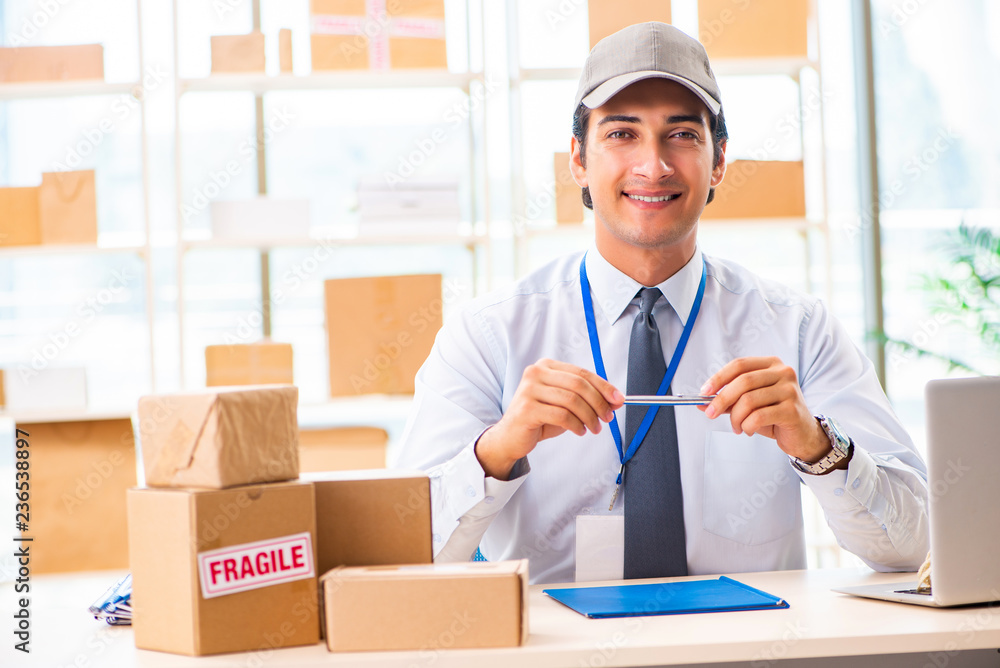 Male employee working in box delivery relocation service Male employee working in box delivery relocation service