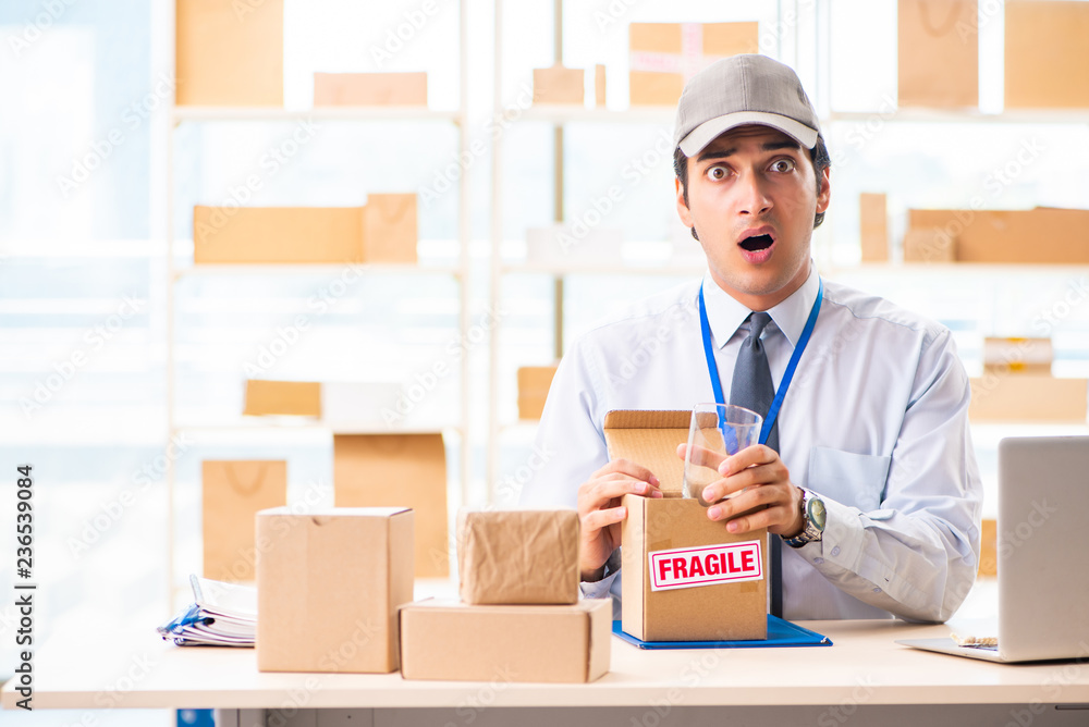 Male employee working in box delivery relocation service Male employee working in box delivery relocation service