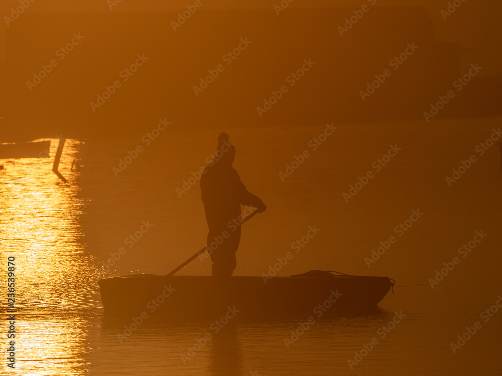 fisherman and sunrise