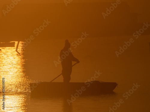 fisherman and sunrise © Luis