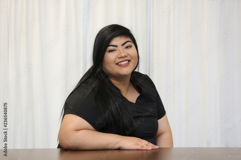 Portrait of an attractive multi ethnic healthcare professional. Portrait of a female nurse. Portrait of an attractive multi ethnic healthcare professional. Portrait of a female nurse.