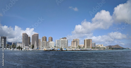 Skyline of Waikiki and Diamond Head during day with yachts and boats in Ala Moana harbor