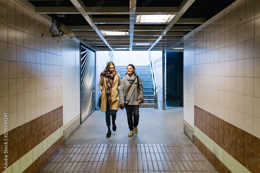 Women walking in subway Women walking in subway