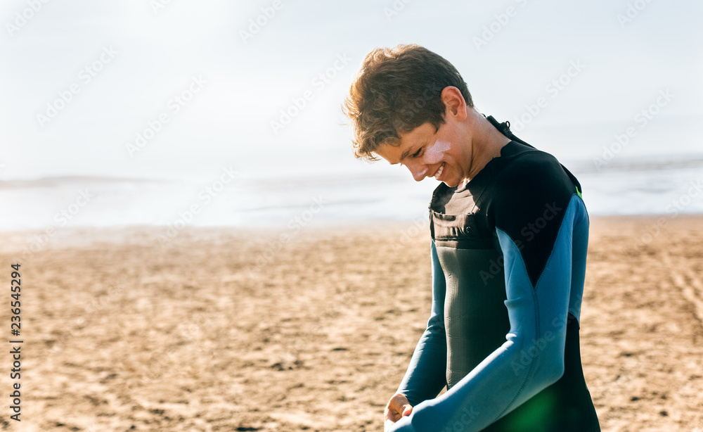 Portrait of a surfer boy before surfing Portrait of a surfer boy before surfing